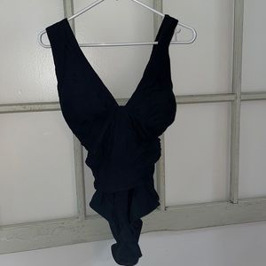 Black one piece swim suit.